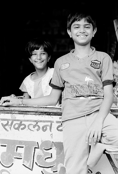 boy and girl smiling at the counter