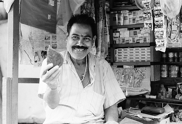 Man Shows Betel Leaf (India)