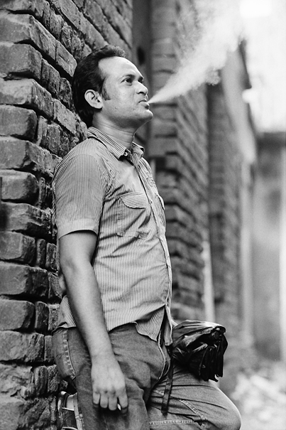 Man Pouring Out Cigarette Smoke (India)