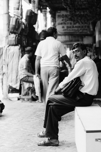 Man Hiding From The Rain (India)