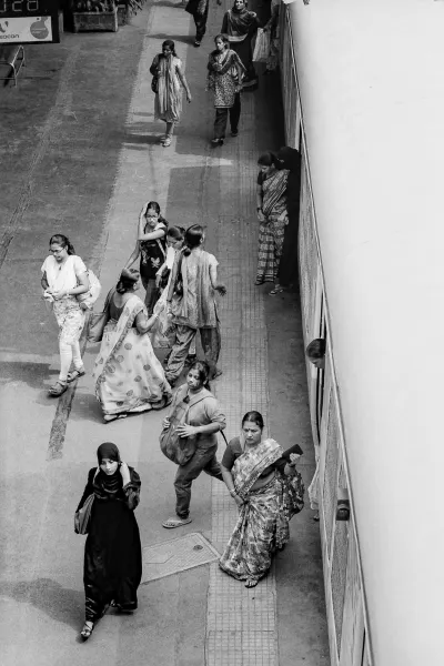 Women walking on platform