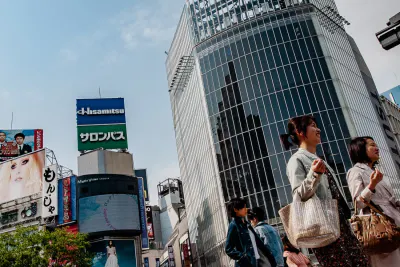 Women walking with bag in Shibuya