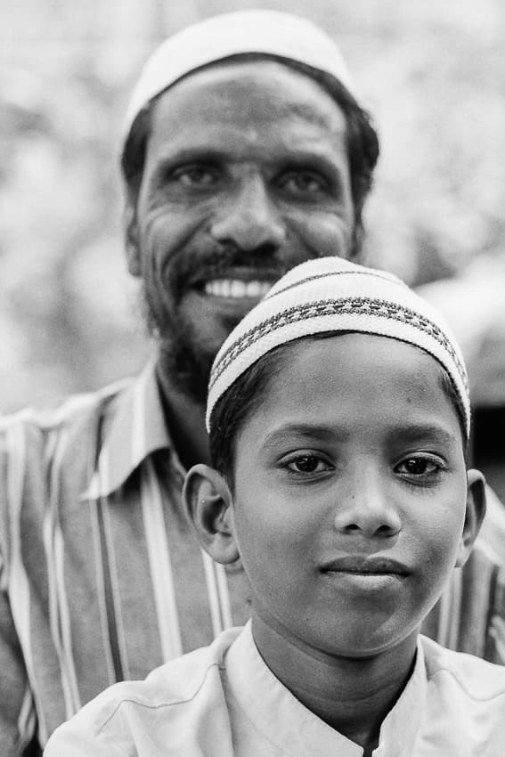 Boy and father wearing Taqiyah
