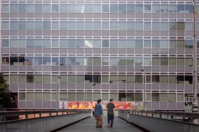 Two men on pedestrian bridge