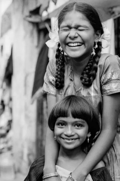 Girl with bobbed hair and girl with braid