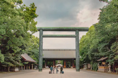 Men in front of Torii