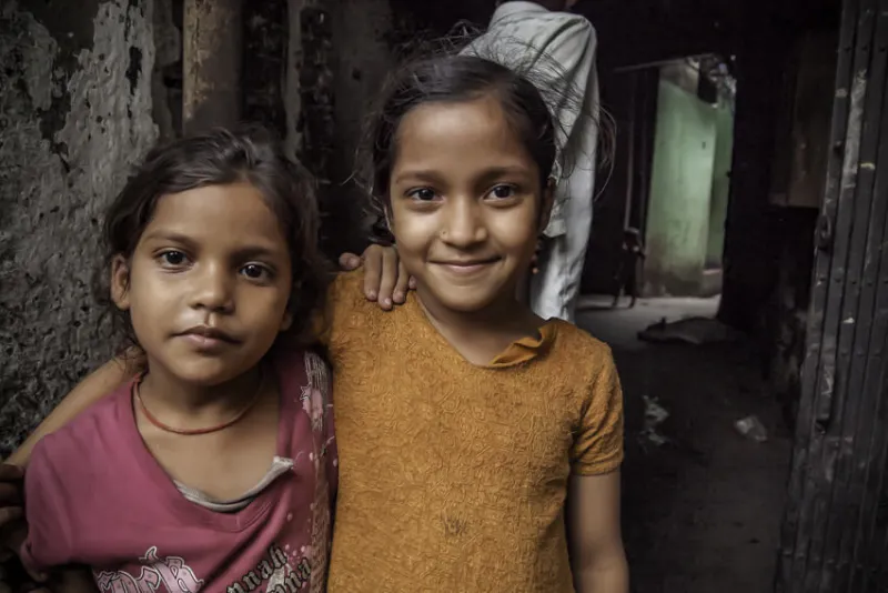 Two girls standing together