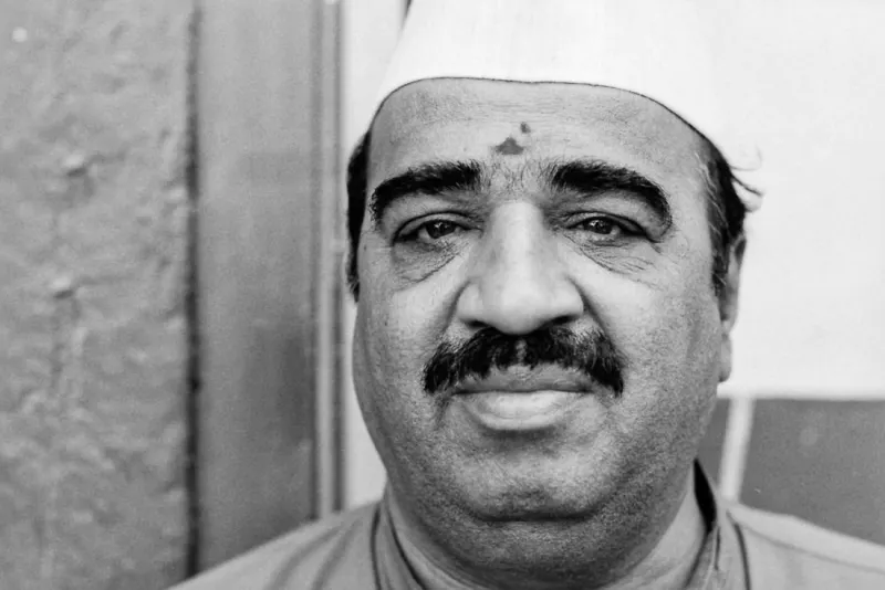 Man wearing Gandhi cap