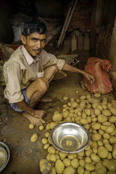 Man selling potatoes