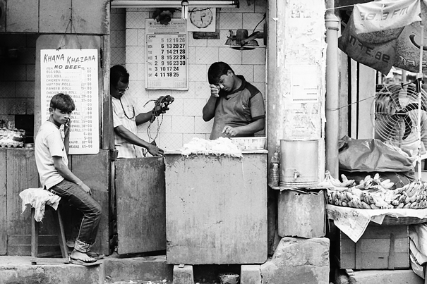 Three Men In A Shop (India)