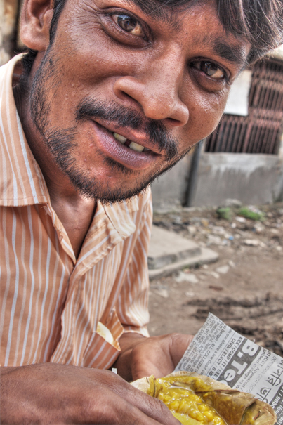 Man Eating Snack (India)