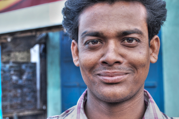 Young Man Palying A Smile (India)