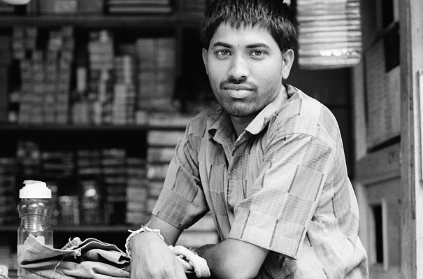 Unshaven Man At A General Store (India)