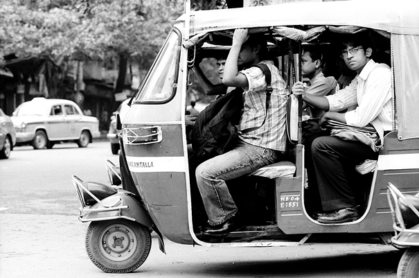 Passengers On An Auto Rickshaw (India)