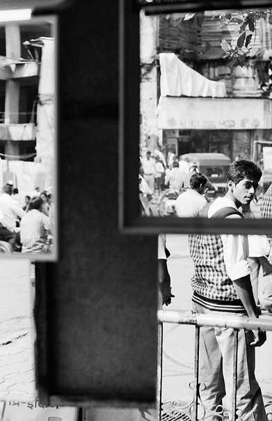 Young man in mirrors