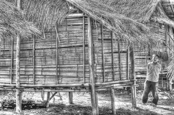 Boy Among Sheds (Laos)