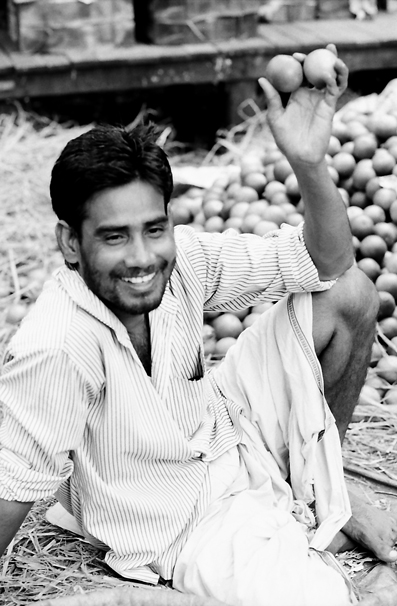 Two Oranges In His Hand (India)