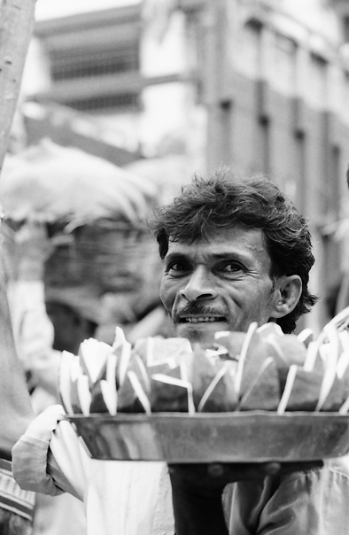 Man Hawking Coconuts (India)
