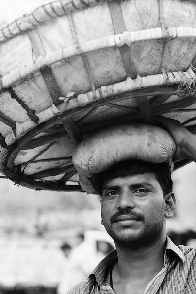 Huge Basket On His Head (India)