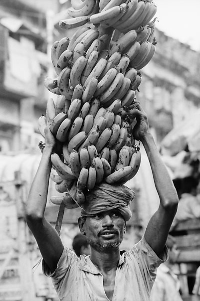 Big bunch of banana on head
