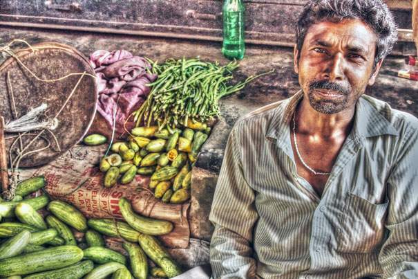 Man Selling Cucumbers (India)