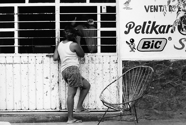 Stand Talking In Front Of A Shop (Mexico)