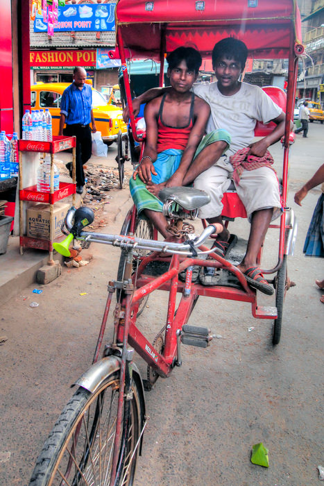 Two men on cycle rickshaw