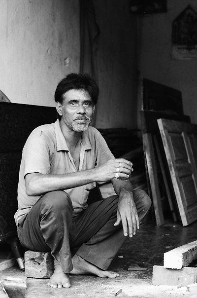 Resting Shoeless Craftsman (India)