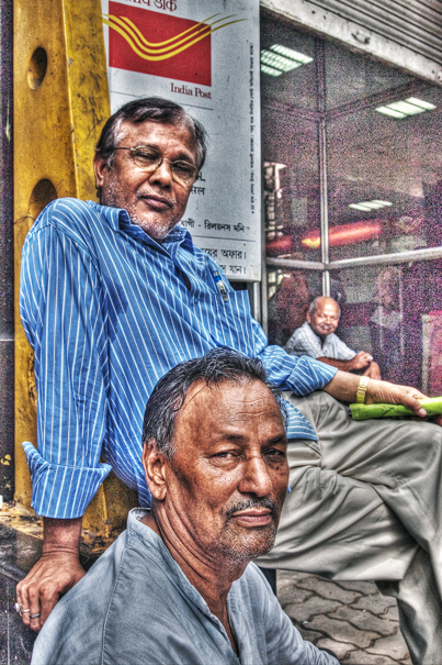 Two Men At The Entrance Of A Post Office (India)