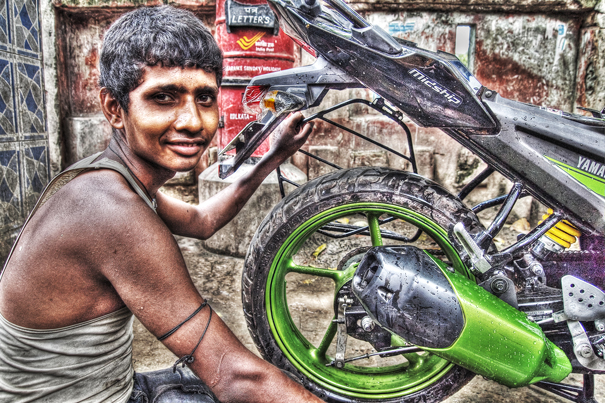 Man And A Rear Wheel (India)