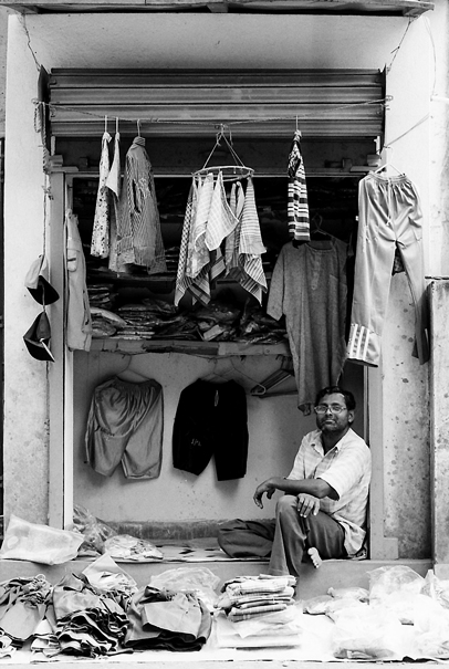 Man selling old clothes