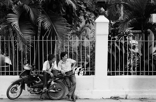A Motorbike And Two Men (Vietnam)