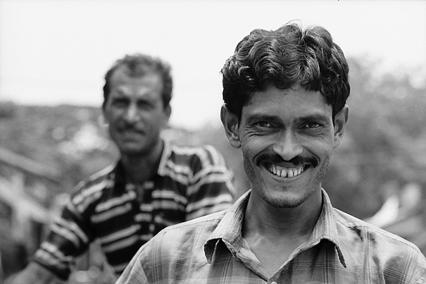 Smiling Man And Uninterested Man (India)