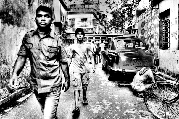 Men Walking The Lane (India)