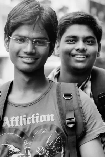 Young men with backpacks on their backs