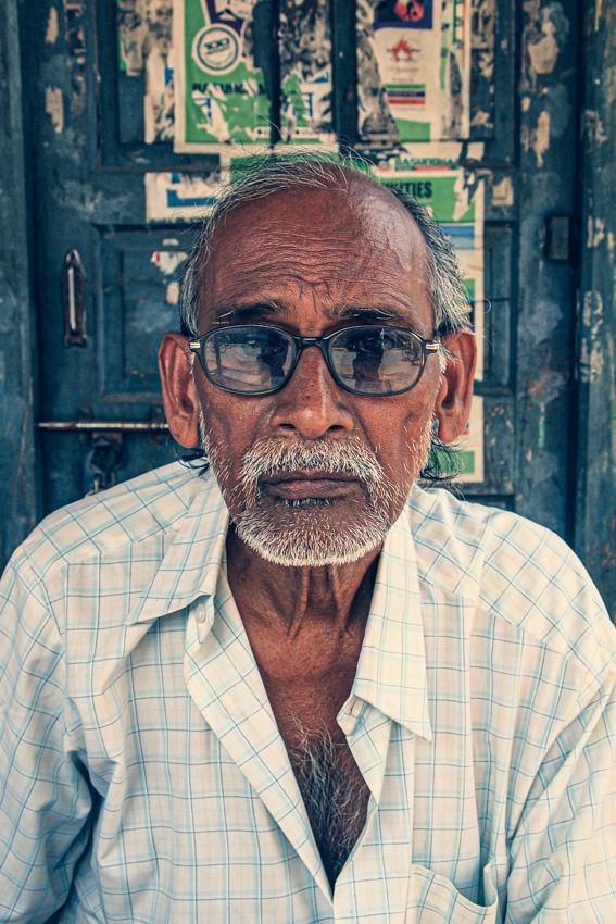 Man sitting in front of door