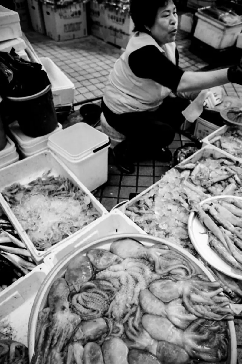 Woman selling octopus