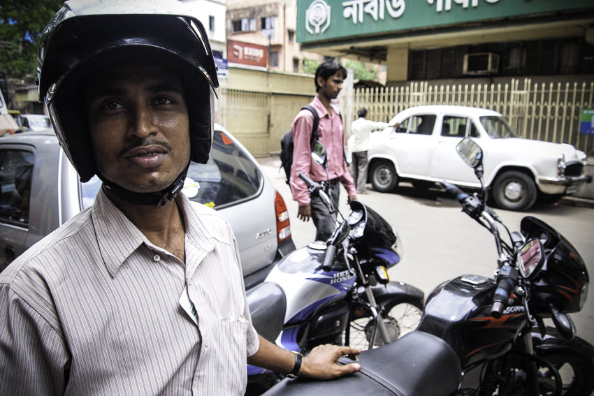 [Kolkata, India] Man Wearing A Helmet Photo with essay by