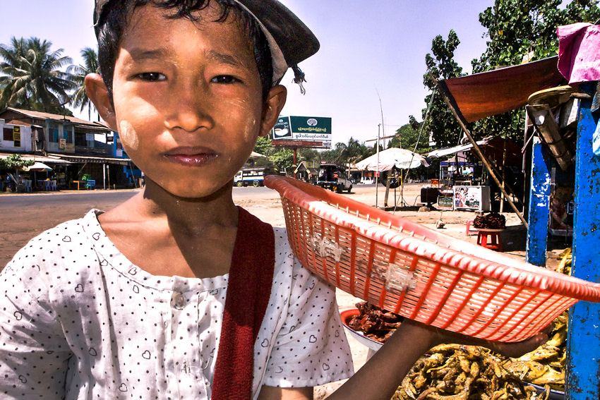 Boy selling eggs