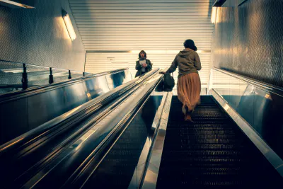 Woman on an escalator