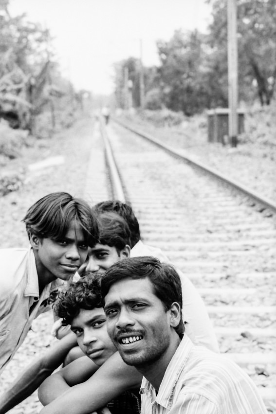 Men relaxing on the railway