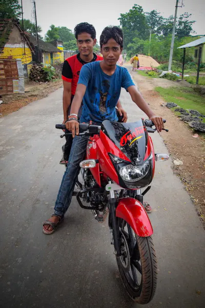 Two men on motorbike