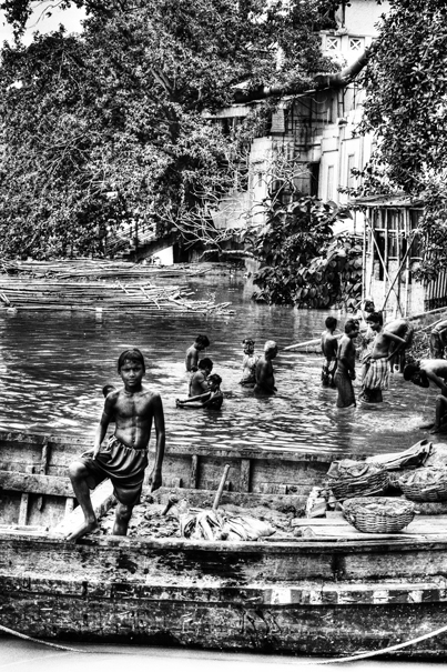 Boy Standing On A Boat (India)