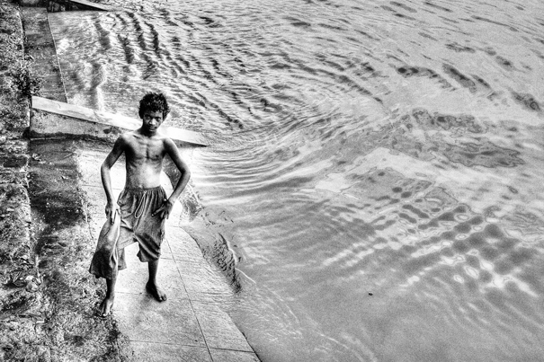 Young Man On The Riverbank (India)