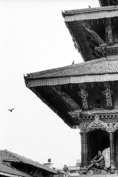 Man Relaxing In A Temple (Nepal)