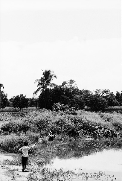 Fishing At The Pond (India)