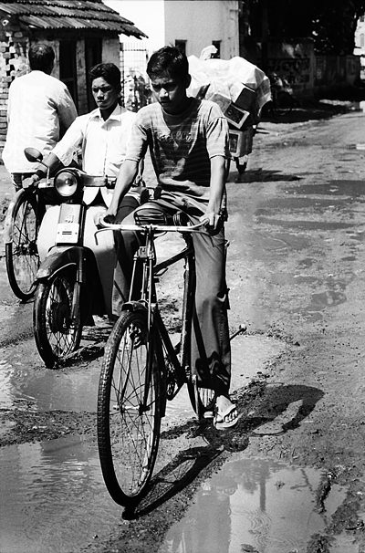 Man Riding The Bicycle (India)