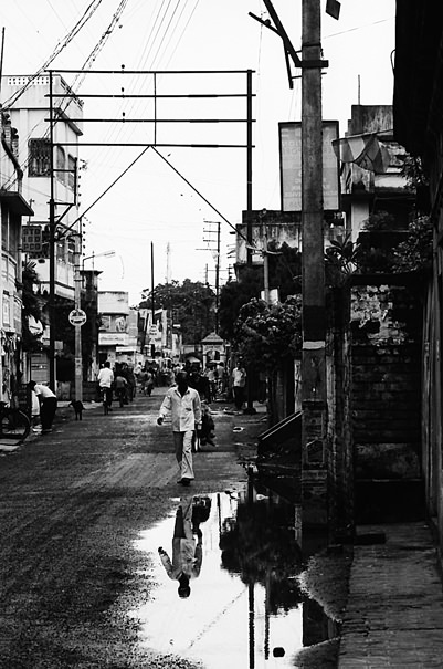 Pedestrian In The Puddle (India)