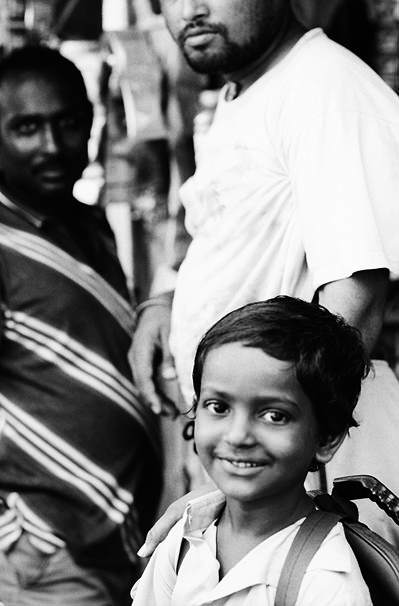 Boy Wearing A Backpack Smiled (India)