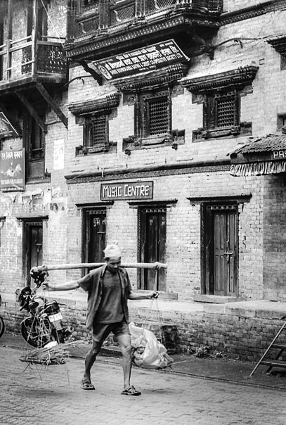 Man Carrying A Yoke (Nepal)